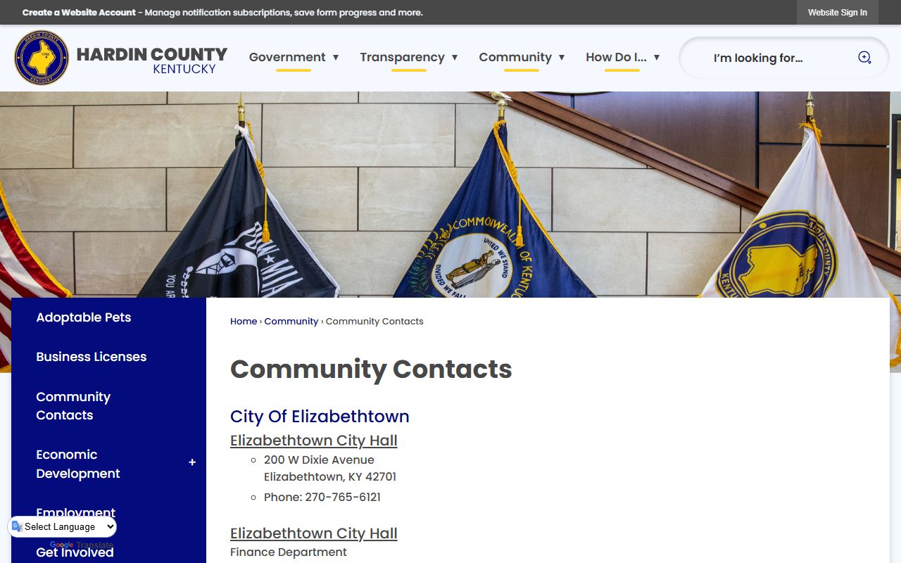 Hardin County community contacts page showing Justice Center and city office phone directory